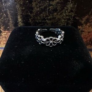 This delicate flower band is size 3